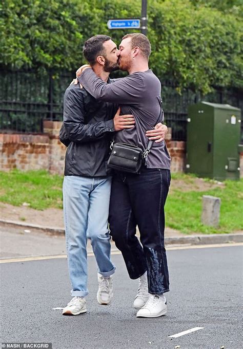 Sam Smith looks smitten as they passionately kiss hunky new boyfriend Francois Rocci - ReadSector