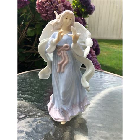 Vintage Porcelain Angel Figurine Holding A Dove Angel Wings Flowing