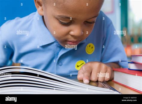 Boy Reading Stock Photo Alamy