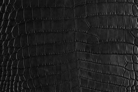 Premium Photo Closeup Of Seamless Crocodile Black Leather Texture