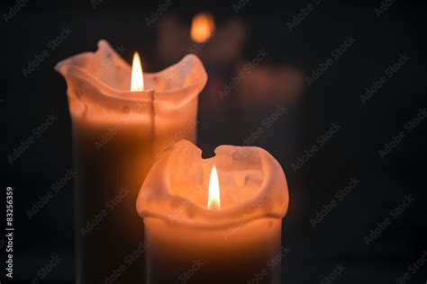 Burning candles Stock Photo | Adobe Stock