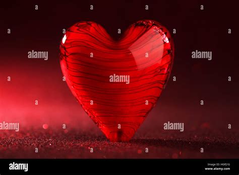Shiny red heart background Stock Photo - Alamy