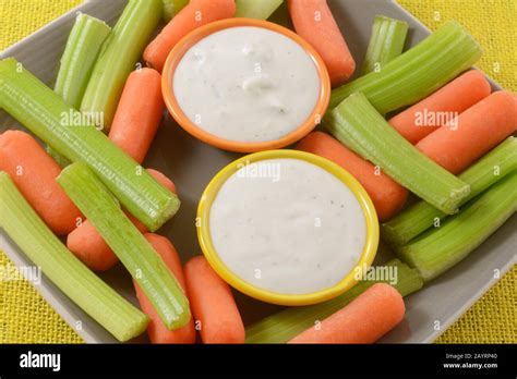 Raw Carrots And Celery Vegetable Snack Plate For Two With Small Bowls