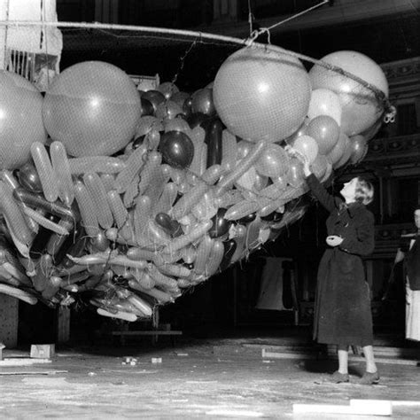 1933 A Net Full Of Balloons Waiting To Be Raised To The Ceiling Of