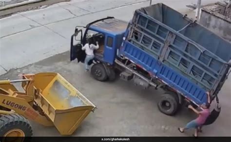 viral video brave woman jumps  moving truck applies handbrake  nick  time