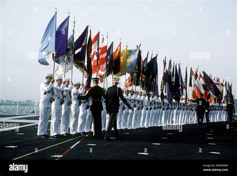 A U S Navy Color Guard Parades The State Flags Aboard The Aircraft