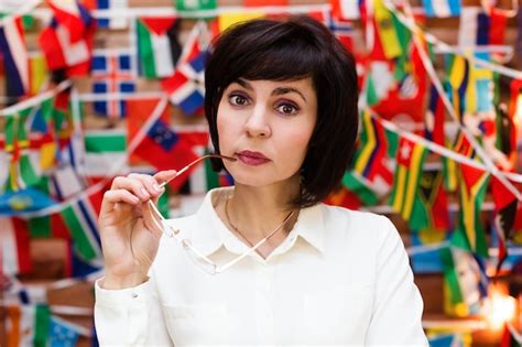 Premium Photo Brunette Woman Sexy Holding Glasses Near Lips