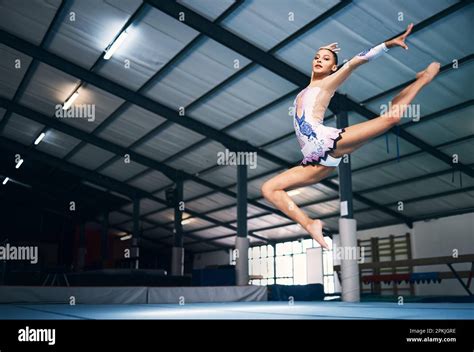 Dance Jump And A Woman In Gymnastics Practice Artistic Hobby And