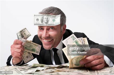 5124 Man With Money Head Stock Photos High Res Pictures And Images