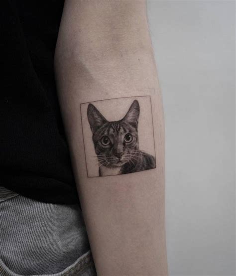 Micro Realistic Cat Tattoo On The Inner Forearm