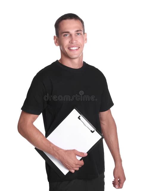 Portrait Of Personal Trainer With Clipboard On White Background Gym