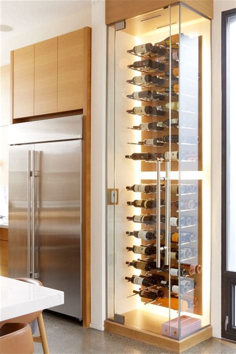 A Wine Rack In The Corner Of A Kitchen