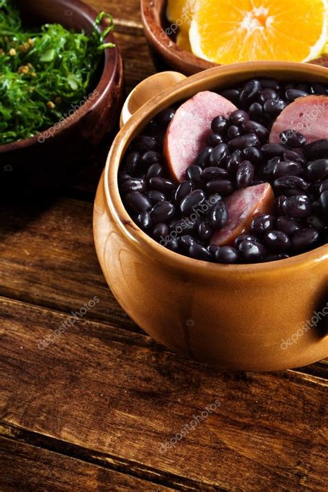 Typical brazilian dish feijoada Stock Photo by ©diogoppr 69740951