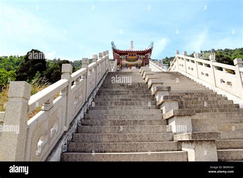 An Image Of A Stone Stairway To An Ancient Chinese Temple On A Hill