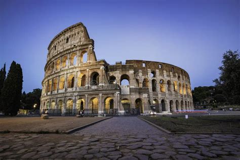 View Of The Colosseum At Sunset A Famous Landmark From Roman Empire