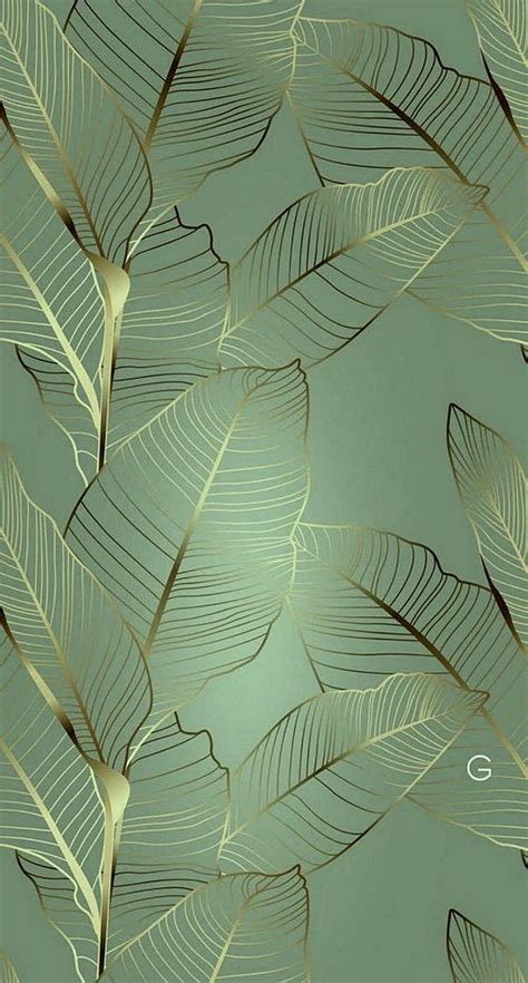 Gold Leaves On A Green Background