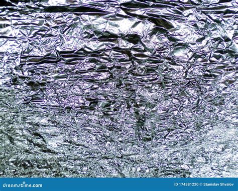 Background Texture Of Crumpled Silver Foil Shiny Crumpled Foil Stock