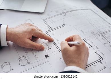 Mature Architect Working Drawings Office Closeup Stock Photo 1390822142