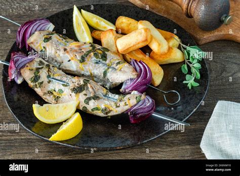 Fish And Chips With Grilled Mackerel Kebabs Stock Photo Alamy