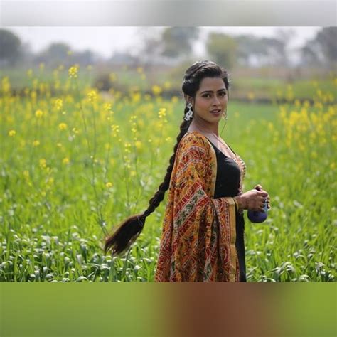 Border Fame Actress Drinking Coffee In A Mustard Field And Her