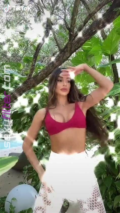 Cute Késia Muniz de Oliveira Shows Cleavage in Red Bikini Top while