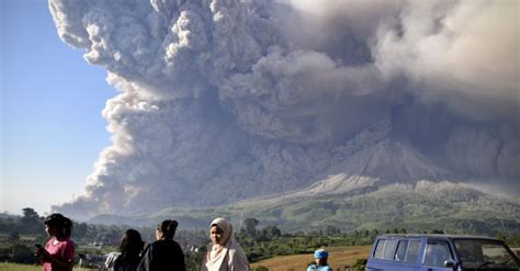 Erupting Indonesian Volcano Covers Villages In Ash