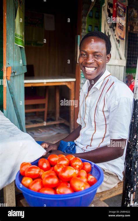 Vendor, Greengrocery, in the fishing village of Kolunga, Rusinga Island ...