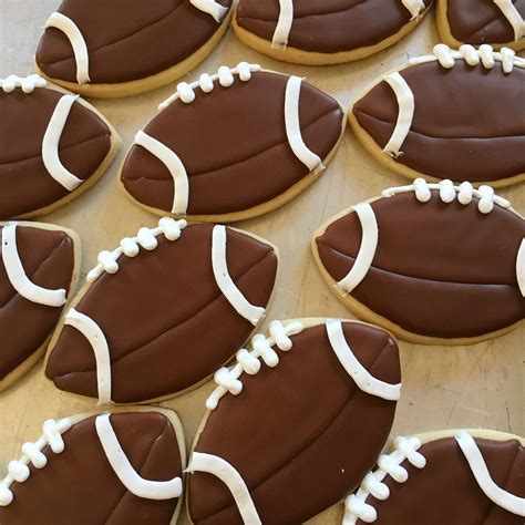 Footballs! #football #footballcookies #decoratedcookies Iced Cookies ...