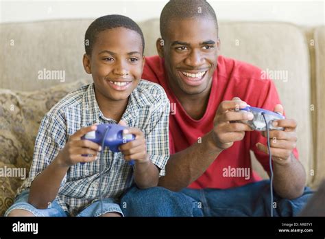 Brothers Playing Video Game Stock Photo - Alamy