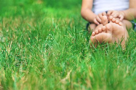 Little Kids Standing Barefoot On Lush Green Park Grass Artistic Focus Photo Background And ...