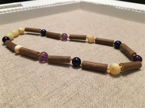 Hazelwood Necklace Raw Milk Amber Amethyst Lapis Lazuli Adult