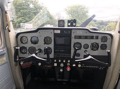 the cockpit of an airplane with multiple controls