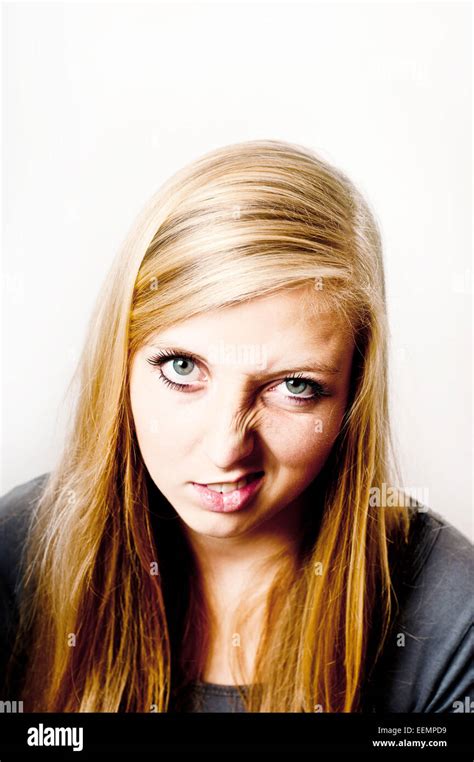 Blond Teenager Girl Making A Funny Disgusted Face Stock Photo Royalty