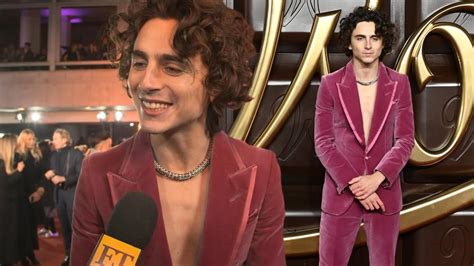 Timoth E Chalamet Reacts To His Purple Shirtless Suit At Chilly Wonka