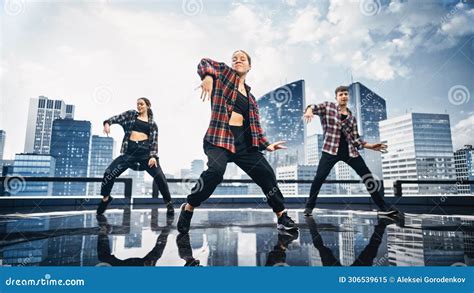 Diverse Group Of Three Professional Dancers Performing A Hip Hop Dance