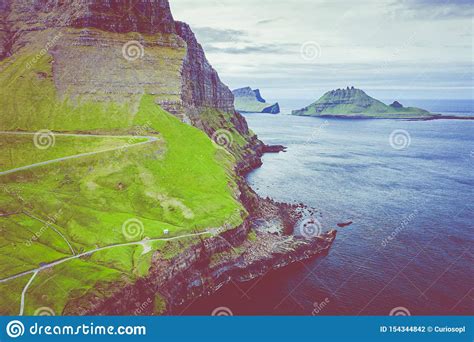 Aerial View Of Mulafossur Waterfall In Gasadalur Village In Faroe