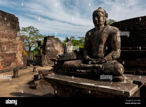 A Seated Buddha Statue Within The Vatadage Which Forms Part Of The