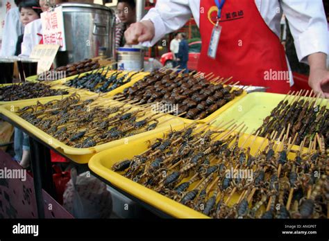 Insects and scorpions on sticks at a night food market in Beijing China ...