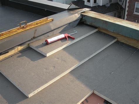 Water Managed Roof Re Roofing And Adding Insulation Over A Flat Roof Building America