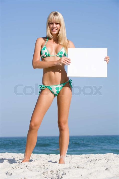 Woman On Beach Holding Blank Card Wearing Bikini Stock Image Colourbox