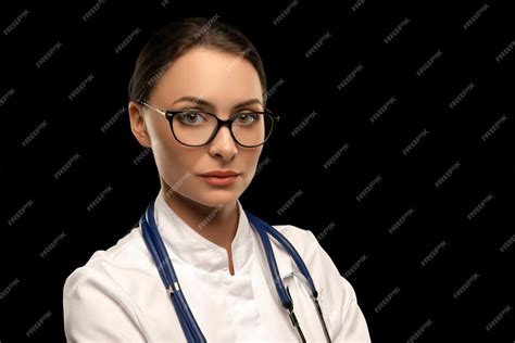 Premium Photo Portrait Of An Attractive Young Female Doctor In White Coat