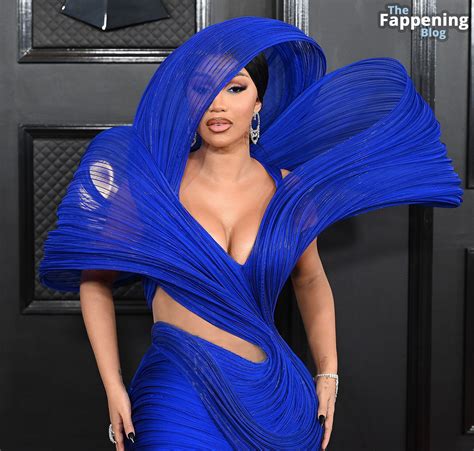 🔴 Cardi B Flaunts Her Sexy Boobs At The 65th Annual Grammy Awards 57