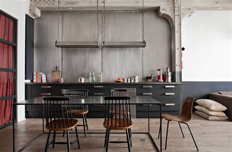 Black kitchen cabinets in industrial style kitchen – Remodeling Cost ...