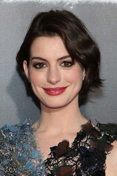 Anne Hathaway With A Messy Bob Kohl Lined Eyes And Bright Berry Lips