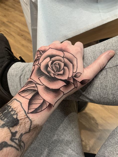 Black Rose Hand Tattoos