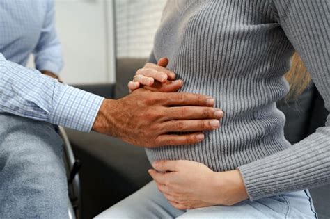 Premium Photo Black Man Touches The Belly Of His Pregnant Wife Close Up