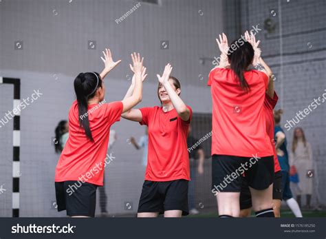 team active girls sports uniform expressing stock photo edit