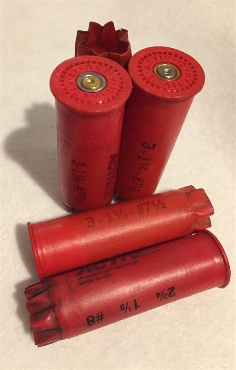 Unique Empty Shotgun Shells Once Fired Hulls Red Spent Casings