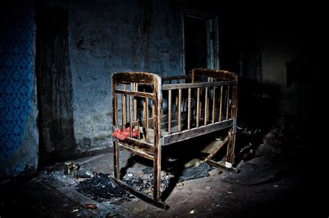 Old Creepy Eerie Wooden Baby Crib In Abandoned House Horror Concept