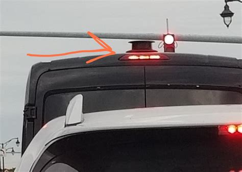 What Is This Black Spinning Thing On Top Of Big Black Van Ot Speeds Up